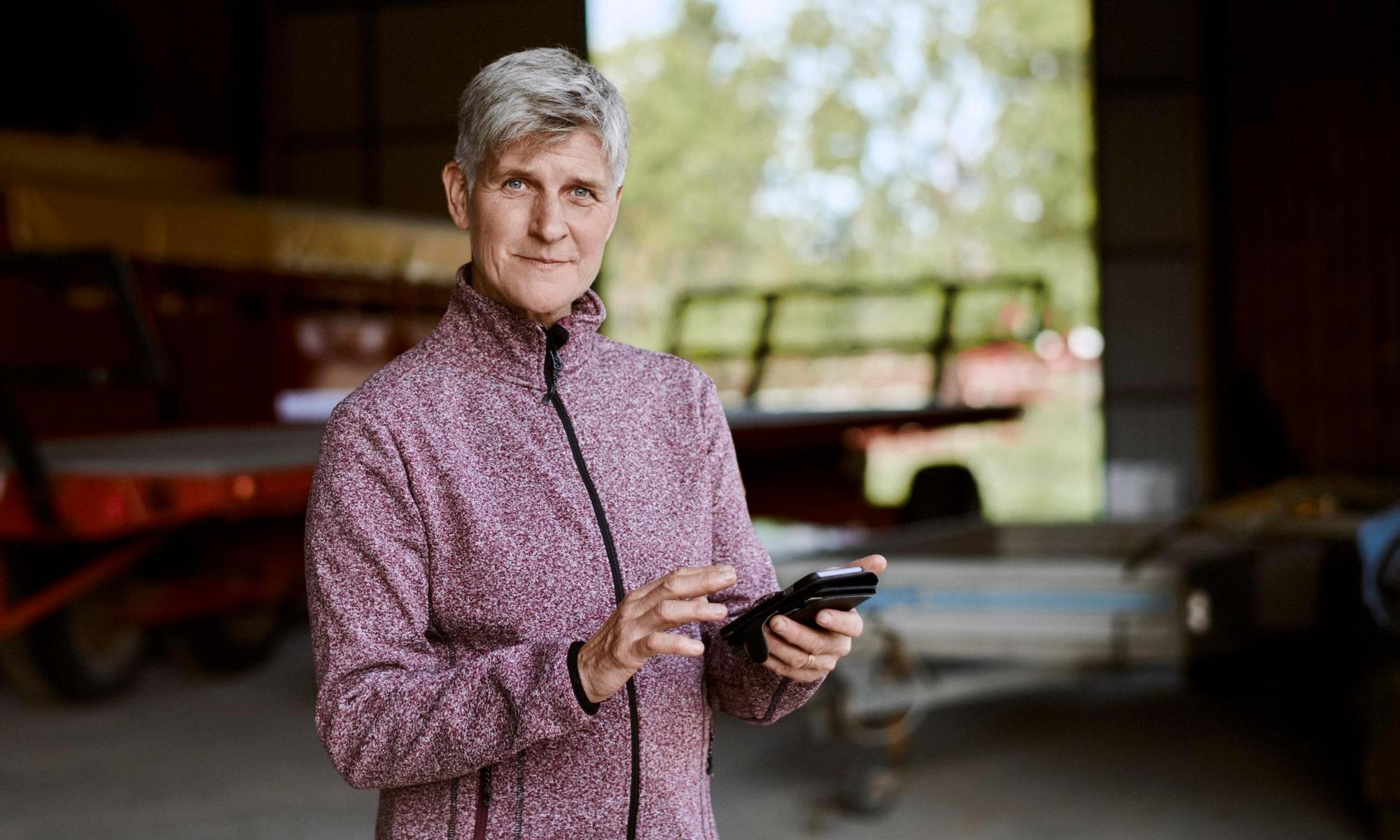 Female farmer using the app