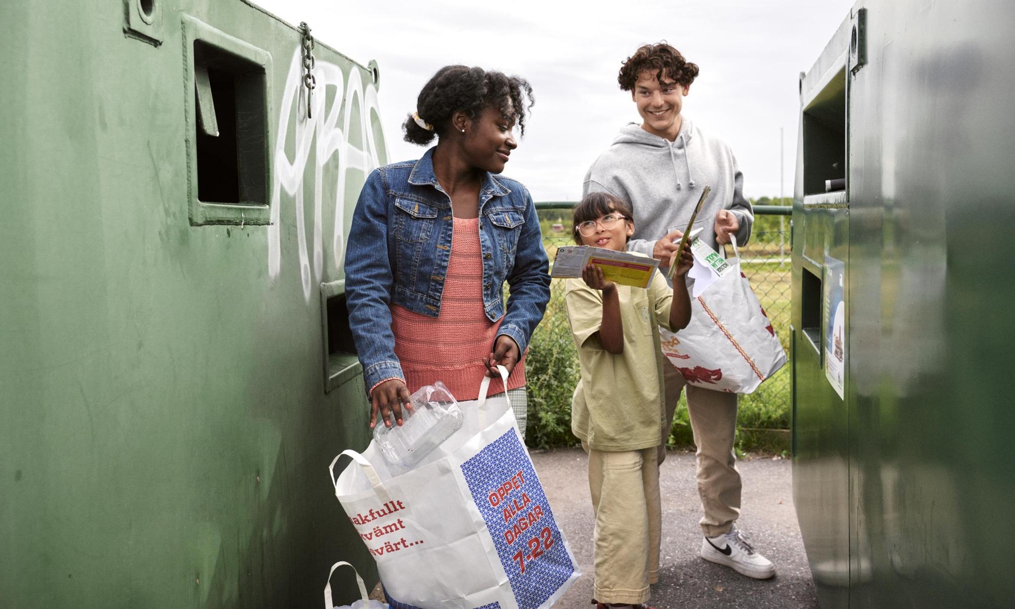 Young people recycling paper and plastic